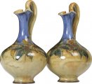 A pair of Royal Doulton Jugs